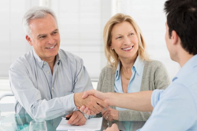 couple in their 50s getting financial advise from russ wagner stuart iowa financial planner